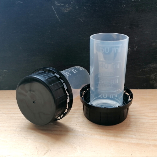 bouchon doseur gradué, lessives et produits d'entretien